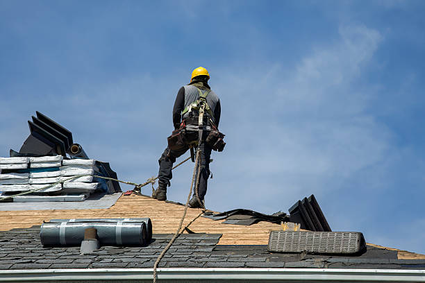 Professional Roof Replacement technician working in Mystic, IA